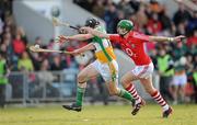 21 February 2010; Conor Mahon, Offaly, is tackled by Eoin Cadogan, Cork. Allianz GAA Hurling National League Division 1 Round 1, Cork v Offaly. Pairc Ui Chaoimh, Cork. Picture credit: Ray McManus / SPORTSFILE