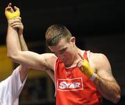 27 February 2010; John Joe Joyce, St Michaels Athy, red, is victorious over Roy Sheehan, St Michaels Athy, blue, folowing their 69kg bout. National Mens Elite Championships Semi-Finals - Saturday, National Stadium, Dublin. Picture credit: Stephen McCarthy / SPORTSFILE