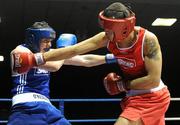 27 February 2010; Tommy McCarthy, Oliver Plunkett, red, exchanges punches with Michael Ward, St Ailbhes, blue, during their 81kg bout. National Mens Elite Championships Semi-Finals - Saturday, National Stadium, Dublin. Picture credit: Stephen McCarthy / SPORTSFILE