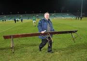 27 February 2010; Chief match steward John Naughton returns the team bench after the traditional team photographs. 1 Round 2, Limerick v Cork, Gaelic Grounds, Limerick. Picture credit: Diarmuid Greene / SPORTSFILE