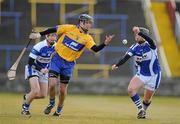 28 February 2010; Brian O'Connell, Clare, in action against John Brophy, left, and Eamon Jackman, Laois. Allianz GAA Hurling National League Division 2 Round 2, Laois v Clare, O'Moore Park, Portlaoise, Co. Laois. Picture credit: Pat Murphy / SPORTSFILE