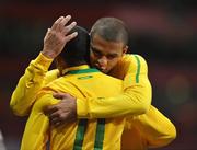 2 March 2010; Brazil's Felipe Melo celebrates with team-mate Robinho, 11, whose cross was deflected in off Republic of Ireland's Keith Andrews for their side's first goal of the game. International Friendly, Republic of Ireland v Brazil, Emirates Stadium, London, England. Picture credit: David Maher / SPORTSFILE