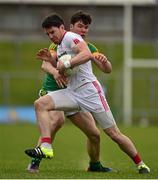 13 March 2016; Mattie Donnelly, Tyrone, in action against Harry Rooney, Meath. Allianz Football League, Division 2, Round 5, Meath v Tyrone. Páirc Táilteann, Navan, Co. Meath. Picture credit: Ramsey Cardy / SPORTSFILE
