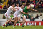 13 March 2016; Cillian O’Sullivan, Meath, is tackled by Tiernan McCann, supported by Mattie Donnelly, Tyrone. Allianz Football League, Division 2, Round 5, Meath v Tyrone. Páirc Táilteann, Navan, Co. Meath. Picture credit: Ramsey Cardy / SPORTSFILE