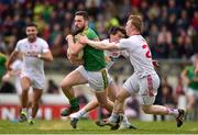 13 March 2016; Michael Newman, Meath, is tackled by Pat McGeary,Tyrone. Allianz Football League, Division 2, Round 5, Meath v Tyrone. Páirc Táilteann, Navan, Co. Meath. Picture credit: Ramsey Cardy / SPORTSFILE