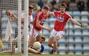 13 March 2016; Cork players, from left, goalkeeper Ryan Price, Kevin Crowley, and Jamie O'Sullivan, watch a shot by Darren Hughes, Monaghan, go narrowly wide of the post. Allianz Football League, Division 1, Round 5, Cork v Monaghan. Páirc Uí Rinn, Cork. Picture credit: Brendan Moran / SPORTSFILE
