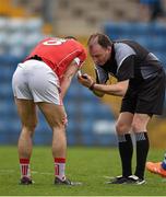 13 March 2016; Kevin O'Driscoll, Cork, has his name taken before being shown a black card by Referee Padraig O'Sullivan. Allianz Football League, Division 1, Round 5, Cork v Monaghan. Páirc Uí Rinn, Cork. Picture credit: Brendan Moran / SPORTSFILE