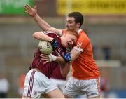 13 March 2016; Adrain Varley, Galway, in action against Brendan Donaghy, Armagh. Allianz Football League, Division 2, Round 5, Armagh v Galway. Athletic Grounds, Armagh. Picture credit: Philip Fitzpatrick / SPORTSFILE