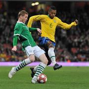 2 March 2010; James McCarthy, Republic of Ireland, making his international debut as a substitute, in action against Michel Bastos, Brazil. International Friendly, Republic of Ireland v Brazil, Emirates Stadium, London, England. Picture credit: David Maher / SPORTSFILE