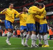 2 March 2010; Robinho, Brazil, right, celebrates with team-mates after scoring his side's second goal. International Friendly, Republic of Ireland v Brazil, Emirates Stadium, London, England. Picture credit: Stephen McCarthy / SPORTSFILE