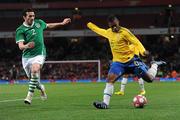 2 March 2010; Michel Bastos, Brazil, in action against Stephen Kelly, Republic of Ireland. International Friendly, Republic of Ireland v Brazil, Emirates Stadium, London, England. Picture credit: Stephen McCarthy / SPORTSFILE