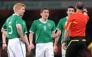 2 March 2010; Republic of Ireland players Paul McShane, left, Keith Andrews and Stephen Kelly remonstrate with referee Mike Dean, England. International Friendly, Republic of Ireland v Brazil, Emirates Stadium, London, England. Picture credit: Stephen McCarthy / SPORTSFILE