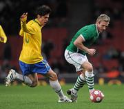 2 March 2010; Liam Lawrence, Republic of Ireland, in action against Kaka, Brazil. International Friendly, Republic of Ireland v Brazil, Emirates Stadium, London, England. Picture credit: Stephen McCarthy / SPORTSFILE