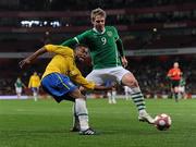 2 March 2010; Michel Bastos, Brazil, in action against Kevin Doyle, Republic of Ireland. International Friendly, Republic of Ireland v Brazil, Emirates Stadium, London, England. Picture credit: Stephen McCarthy / SPORTSFILE