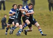 3 March 2010; Tim Rafferty, Rockwell, is tackled by Neil Cronin, left, and Michael O'Dwyer, Castletroy. Avonmore Munster Rugby Schools Senior Cup Semi-Final, Rockwell v Castletroy College, Clanwilliam Park, Tipperary Town, Tipperary. Picture credit: Diarmuid Greene / SPORTSFILE