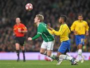 2 March 2010; Kevin Doyle, Republic of Ireland, in action against Michel Bastos, Brazil. International Friendly, Republic of Ireland v Brazil, Emirates Stadium, London, England. Picture credit: David Maher / SPORTSFILE