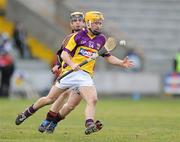 28 February 2010; Peter Atkinson, Wexford, in action against Connor Woods, Down. Allianz GAA Hurling National League Division 2 Round 2, Wexford v Down, Wexford Park, Wexford. Picture credit: Matt Browne / SPORTSFILE