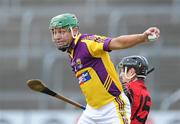 28 February 2010; Keith Rossiter, Wexford in action against Paul Keith, Down. Allianz GAA Hurling National League Division 2 Round 2, Wexford v Down, Wexford Park, Wexford. Picture credit: Matt Browne / SPORTSFILE
