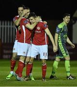 14 March 2016; Mark Timlim, right, St Patrick's Athletic, celebrates after scoring his side's first goal with team-mates Billy Dennehy, left, and Christy Fagan. SSE Airtricity League Premier Division, St Patrick's Athletic v Bohemians. Richmond Park, Dublin. Picture credit: David Maher / SPORTSFILE