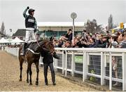 15 March 2016; Nico de Boinville salutes the crowd after winning the Supreme Novices' Hurdle on Altior. Prestbury Park, Cheltenham, Gloucestershire, England. Picture credit: Cody Glenn / SPORTSFILE