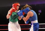 5 March 2010; Katie Taylor, Bray, Ireland, left, exchanges punches with Julia Tsyplakova, Ukraine, during their womens 60kg special bout. National Men's & Women's Elite National Championships 2010 Finals - Friday, National Stadium, Dublin. Picture credit: Stephen McCarthy / SPORTSFILE