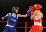 5 March 2010; Jennifer Harte, Four Corners, right, exchanges punches with Catherine O'Grady, Clann Naofa, during their 48kg women's novice final bout. National Men's & Women's Elite National Championships 2010 Finals - Friday, National Stadium, Dublin. Picture credit: Stephen McCarthy / SPORTSFILE