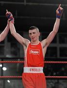 5 March 2010; Tyrone McCullough, Illies Golden Gloves, is victorious over James Fyers, Immaculata, following their elite 57kg final bout. National Men's & Women's Elite National Championships 2010 Finals - Friday, National Stadium, Dublin. Picture credit: Stephen McCarthy / SPORTSFILE