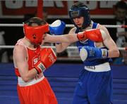 5 March 2010; Paddy Barnes, Holy Family Golden Gloves, exchanges punches with Jimmy Moore, St Francis Limerick, during their elite 48kg final. National Men's & Women's Elite National Championships 2010 Finals - Friday, National Stadium, Dublin. Picture credit: Stephen McMahon / SPORTSFILE