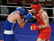 5 March 2010; Willie McLoughlin, Illies Golden Gloves, right, exchanges punches with John Joe Joyce, St Michaels Athy, during their 69kg bout. National Men's & Women's Elite National Championships 2010 Finals - Friday, National Stadium, Dublin. Picture credit: Stephen McMahon / SPORTSFILE