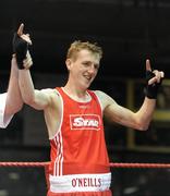 6 March 2010; Michael Hawkins, Holy Trinity, is victorious over Chris Smith, Canal, following their men's novice 54kg final. Men's Novice National Championships 2010 Finals - Saturday Afternoon Session, National Stadium, Dublin. Picture credit: Stephen McCarthy / SPORTSFILE
