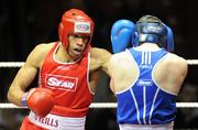 6 March 2010; Julio Carvalio, Monkstown Antrim, left, exchanges punches with Paul Farrell, Sacred Heart Dublin, during their men's novice 75kg bout. Men's Novice National Championships 2010 Finals - Saturday Afternoon Session, National Stadium, Dublin. Picture credit: Stephen McCarthy / SPORTSFILE