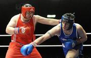 6 March 2010; Trevor Foley, Crumlin, left, exchanges punches with Jonathan York, Springhill, during their men's novice 91+kg bout. Men's Novice National Championships 2010 Finals - Saturday Afternoon Session, National Stadium, Dublin. Picture credit: Stephen McCarthy / SPORTSFILE