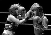 6 March 2010; Frances Rock, Baldoyle, left, exchanges punches with Noreen Crawford, Dungarvan, during their women's novice 63kg final bout. Men's Elite & Women's Novice National Championships 2010 Finals - Saturday Evening Session, National Stadium, Dublin. Picture credit: Stephen McCarthy / SPORTSFILE