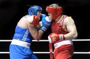 6 March 2010; Cathal McMonagle, Holy Trinity, right, exchanges punches with Tommy Sheehan, St Michaels Athy, during their men's elite 91+kg bout. Men's Elite & Women's Novice National Championships 2010 Finals - Saturday Evening Session, National Stadium, Dublin. Picture credit: Stephen McCarthy / SPORTSFILE