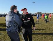 7 March 2010; Tyrone manager Mickey Harte shakes hands with Monaghan manager Seamus McEnaney after defeat to Monaghan. Allianz GAA Football National League, Division 1, Round 3, Monaghan v Tyrone, Inniskeen GAA Grounds, Inniskeen, Co. Monaghan. Picture credit: Brian Lawless / SPORTSFILE