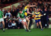 19 April 2001; Mark Foley of Limerick in action against Colin Lynch of Clare during the Allianz GAA National Hurling League Division 1A Round 5 match between Limerick and Clare at the Gaelic Grounds in Limerick. Photo by Ray McManus/Sportsfile