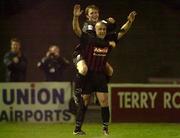 27 April 2001;  Trevor Molloy of Bohemians, top, celebrates with team-mate Paul Byrne after scoring his side's fourth goal during the Eircom League Premier Division match between Bohemians and Finn Harps at Dalymount Park in Dublin. Photo by David Maher/Sportsfile