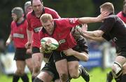 28 April 2001; Shane Stewart of Ballymena is tackled by Colm Power and Michael Prendergast of Young Munster during the AIB League Rugby Division One match between Ballymena v Young Munster at Ballymena Rugby Club in Antrim. Photo by Matt Browne/Sportsfile