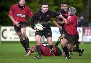 28 April 2001; Mick Lynch of Young Munster is tackled by Rhys Botha of Ballymena during the AIB League Rugby Division One match between Ballymena v Young Munster at Ballymena Rugby Club in Antrim. Photo by Matt Browne/Sportsfile