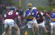 28 April 2001; Liam Cahill of Tipperary in action against Liam Hodgins, 6, and David Tierney of Galway during the Allianz GAA National Hurling League Division 1 Semi-Final match between Galway and Tipperary at Cusack Park in Ennis, Clare. Photo by Brendan Moran/Sportsfile