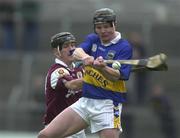 28 April 2001; Conor Gleeson of Tipperary is hooked by Ollie Fahy of Galway during the Allianz GAA National Hurling League Division 1 Semi-Final match between Galway and Tipperary at Cusack Park in Ennis, Clare. Photo by Brendan Moran/Sportsfile