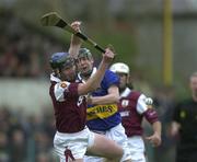 28 April 2001; Liam Hodgins of Galway competes for a dropping ball with Eddie Enright of Tipperary during the Allianz GAA National Hurling League Division 1 Semi-Final match between Galway and Tipperary at Cusack Park in Ennis, Clare. Photo by Brendan Moran/Sportsfile