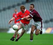 29 April 2001; Aidan Dorgan of Cork is tackled by John Keane of Westmeath during the Allianz GAA National Football League Division 2 Final match between Westmeath and Cork at Croke Park in Dublin. Photo by Ray McManus/Sportsfile