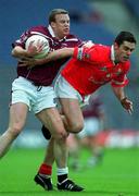 29 April 2001; Damien Gavin of Westmeath is tackled by Martin Cronin of Cork during the Allianz GAA National Football League Division 2 Final match between Westmeath and Cork at Croke Park in Dublin. Photo by Ray McManus/Sportsfile