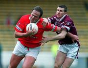 29 April 2001; Colin Corkery of Cork is tackled by Derek Heavin of Westmeath during the Allianz GAA National Football League Division 2 Final match between Westmeath and Cork at Croke Park in Dublin. Photo by Ray McManus/Sportsfile