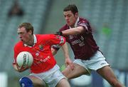 29 April 2001; Philip Clifford of Cork is tackled by Fergal Murray of Westmeath during the Allianz GAA National Football League Division 2 Final match between Westmeath and Cork at Croke Park in Dublin. Photo by Ray McManus/Sportsfile
