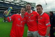 29 April 2001; Westmeath players, wearing Cork jerseys, from left, Dessie Dolan, David O'Shaughnessy, and David Mitchell celebrate after the Allianz GAA National Football League Division 2 Final match between Westmeath and Cork at Croke Park in Dublin. Photo by Ray McManus/Sportsfile