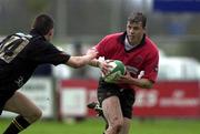28 April 2001; Scott Young of Ballymena is tackled by Finbar Hogan of Young Munster during the AIB League Rugby Division One match between Ballymena v Young Munster at Ballymena Rugby Club in Antrim. Photo by Matt Browne/Sportsfile