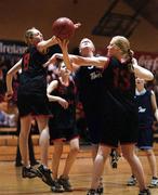 1 May 2001; Joy Neville of Salesian Secondary School in action against Dorothy Gray, 8, and Louise Gray,13, from Monaghan Collegiate School during the Cadbury's Time Out All Ireland Schools &quot;D&quot; Final match between Salesian Secondary School and Monaghan Collegiate School at the National Basketball Arena in Tallaght, Dublin. Photo by Brendan Moran/Sportsfile