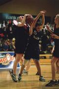 1 May 2001; Louise Gray of Monaghan Collegiate School, in action against Jean McAdam of Salesian Secondary School during the Cadbury's Time Out All Ireland Schools &quot;D&quot; Final match between Salesian Secondary School and Monaghan Collegiate School at the National Basketball Arena in Tallaght, Dublin. Photo by Brendan Moran/Sportsfile